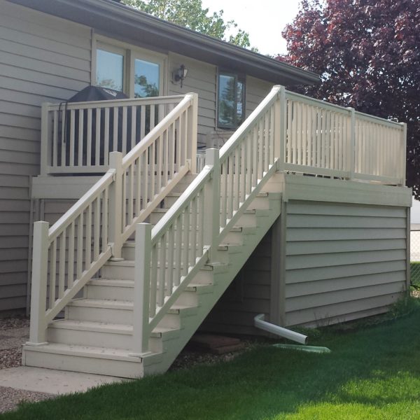 underdeck storage shed with matching siding